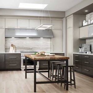 Image shows kitchen featuring custom Woodland Cabinetry