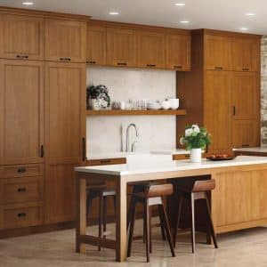 Image shows Woodland Cabinetry Artizen brand Taylor Plus Alder doors with a Nutmeg finish