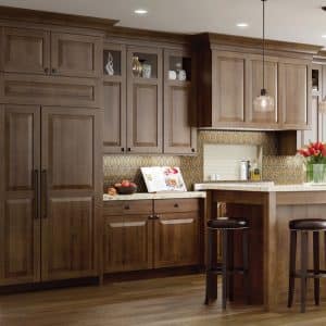 Image from Woodland Cabinetry Inspiration Gallery showing kitchen with Cherry Stained Galveston style cabinetry doors