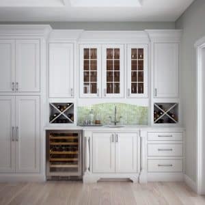 Image from Woodland Cabinetry Inspiration Gallery showing basement kitchen wine storage bar built-in Artisan cabinetry with Easton Plus Maple cabinetry and painted Opaque Lace White
